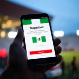 Mobile phone screen displaying Superbet registration form with Nigerian flag icon